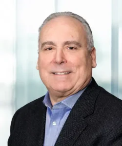 A headshot of John Basso.