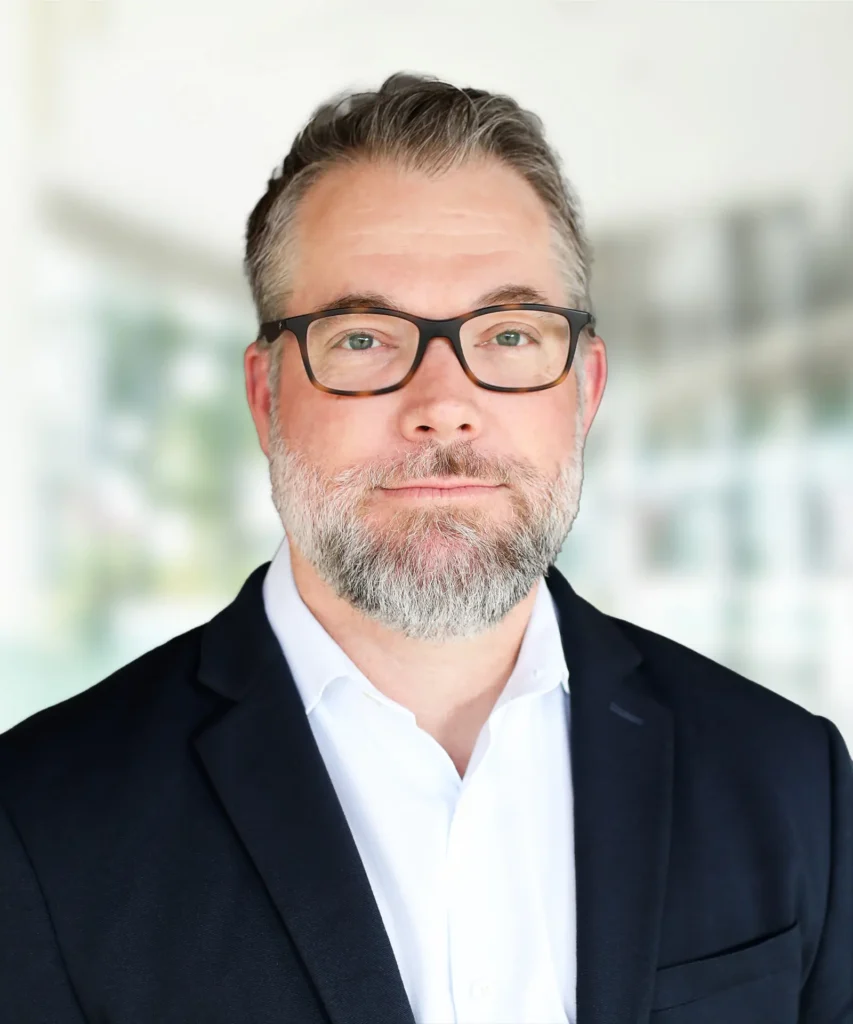 A headshot of Ryan Gregory.